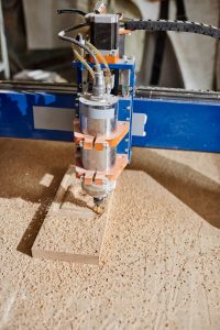 CNC Machine In Woodworking Workshop